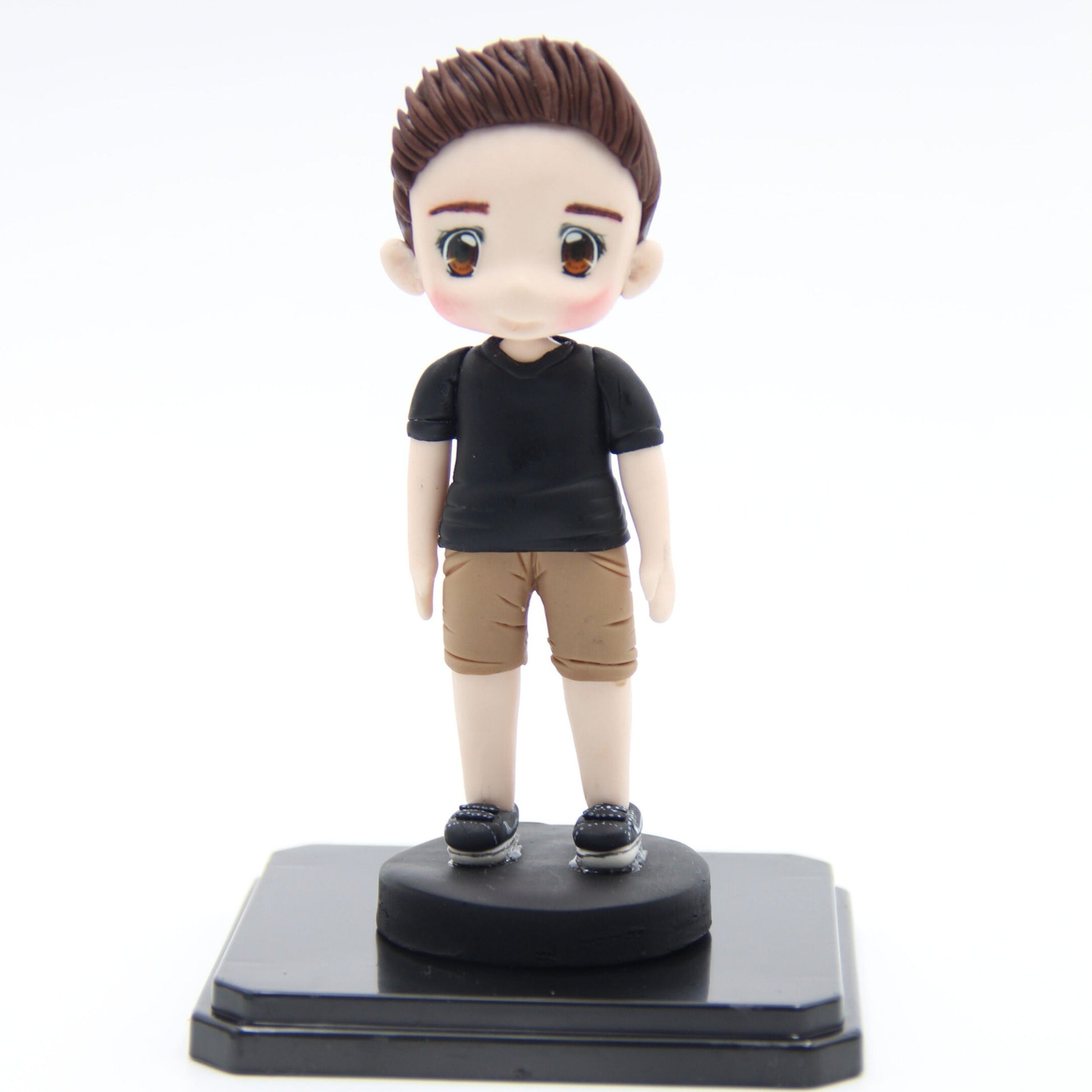 Custom made air dry clay figurine cake topper for weddings, birthdays and special occasions, personalized mini me figure