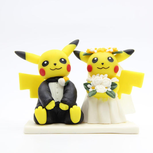 Custom made air dry clay figurine cake topper for weddings, birthdays, themed party and special occasions