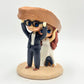 Custom made air dry clay figurine cake topper for weddings, birthdays, themed party and special occasions