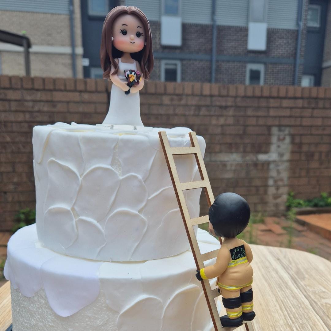 fireman themed wedding cake topper